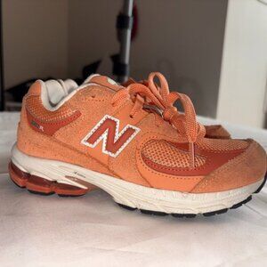 Kids' New Balance 2002R Copper Infield Clay Sea Salt Orange Originals size 2Y